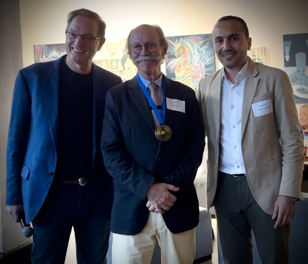 Dr Randy Pardell (president of FACTMS), Prof Mark George and Dr Mohamed Abdelghani during the reception party