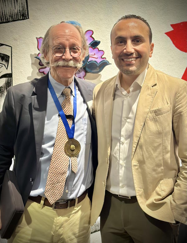Prof Mark George and Dr Mohamed Abdelghani during the reception party at San Francisco on 22nd May